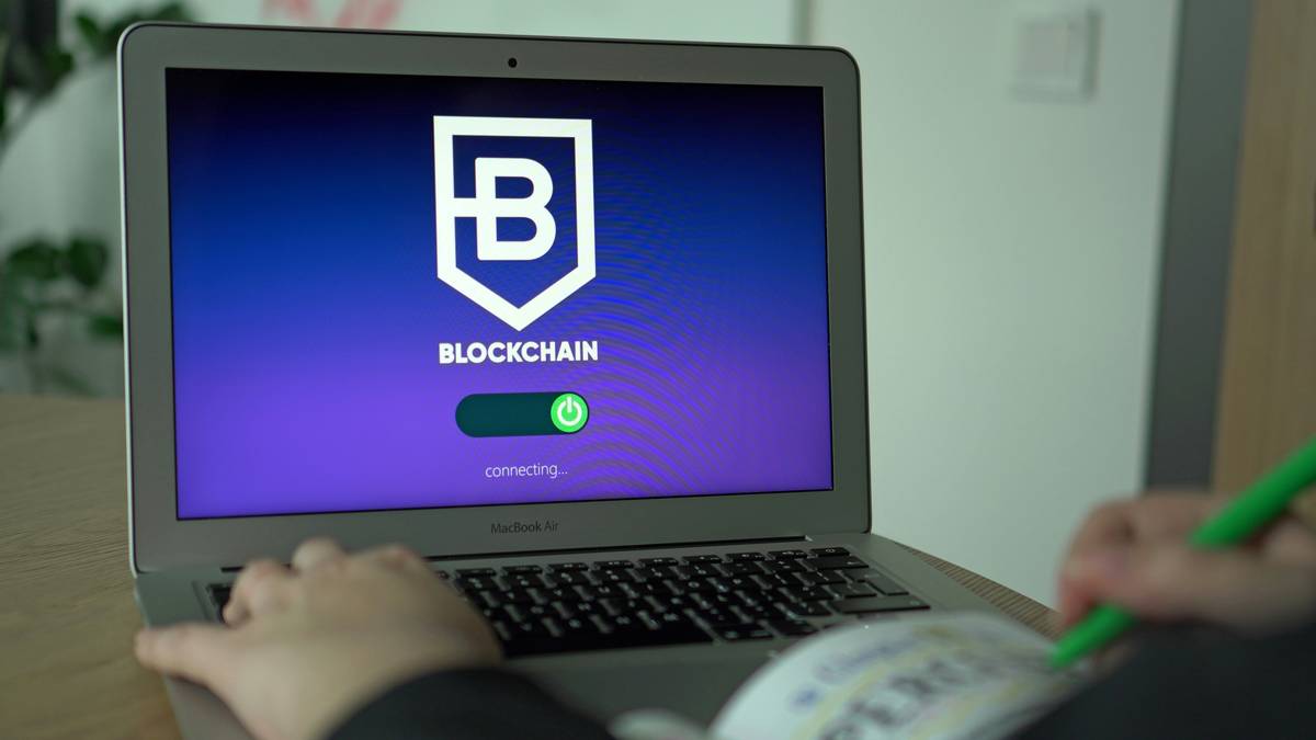 Developer reviewing cryptocurrency smart contract development are on multiple blockchains including Ethereum and Solana
